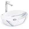 Immagine 1/3 - LIGNANO-M || lavabo da appoggio, ceramica, bianco, effetto marmo, ovale